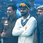 A fan breached security at Arun Jaitley Stadium to touch Virat Kohli’s feet,but Kohli asked security not to harm him.